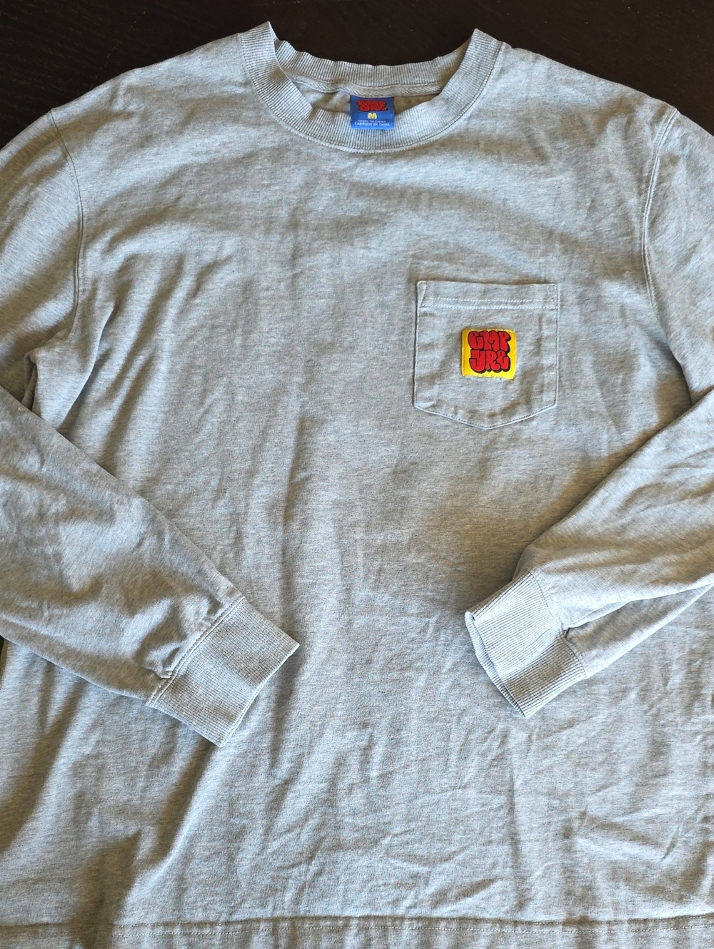 Empyre Light Gray Long Sleeve Pocket Tee with Yellow-Red Patch